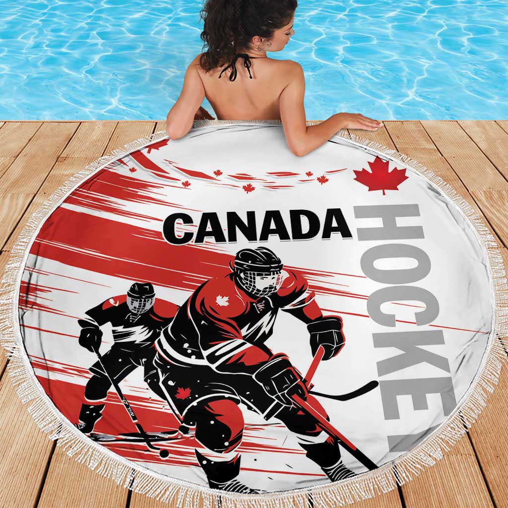 Round red and white hockey beach blanket with CANADA lettering, players, and tassel fringe