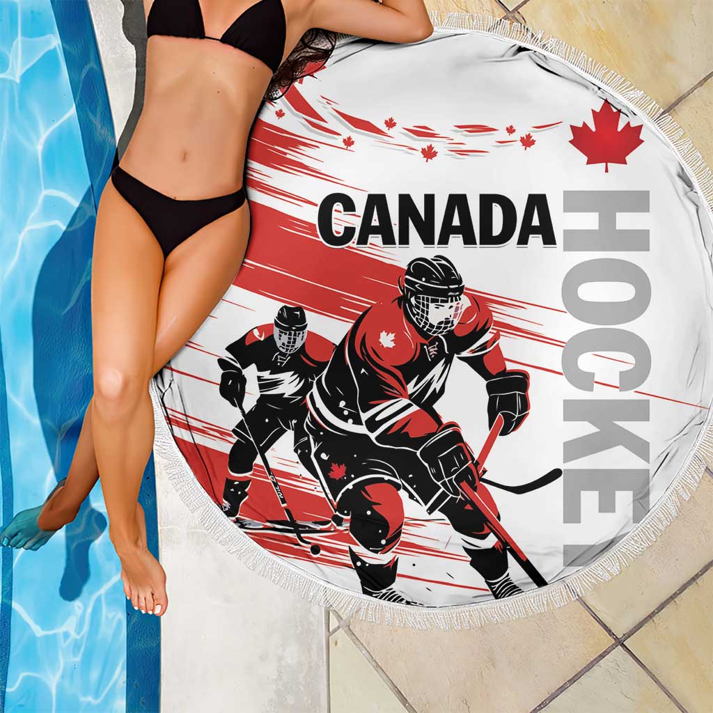 Round red and white hockey beach blanket with CANADA text, goalie players, and fringed border
