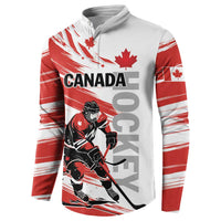 Red and white hockey sweatshirt with Canada text and goalie player graphic