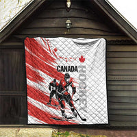 Red and white Canada hockey quilt hanging with diamond quilting and black hockey goalie graphic