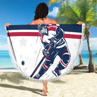 Round beach blanket with fringe, hockey player design and USA Hockey emblem, striped banner