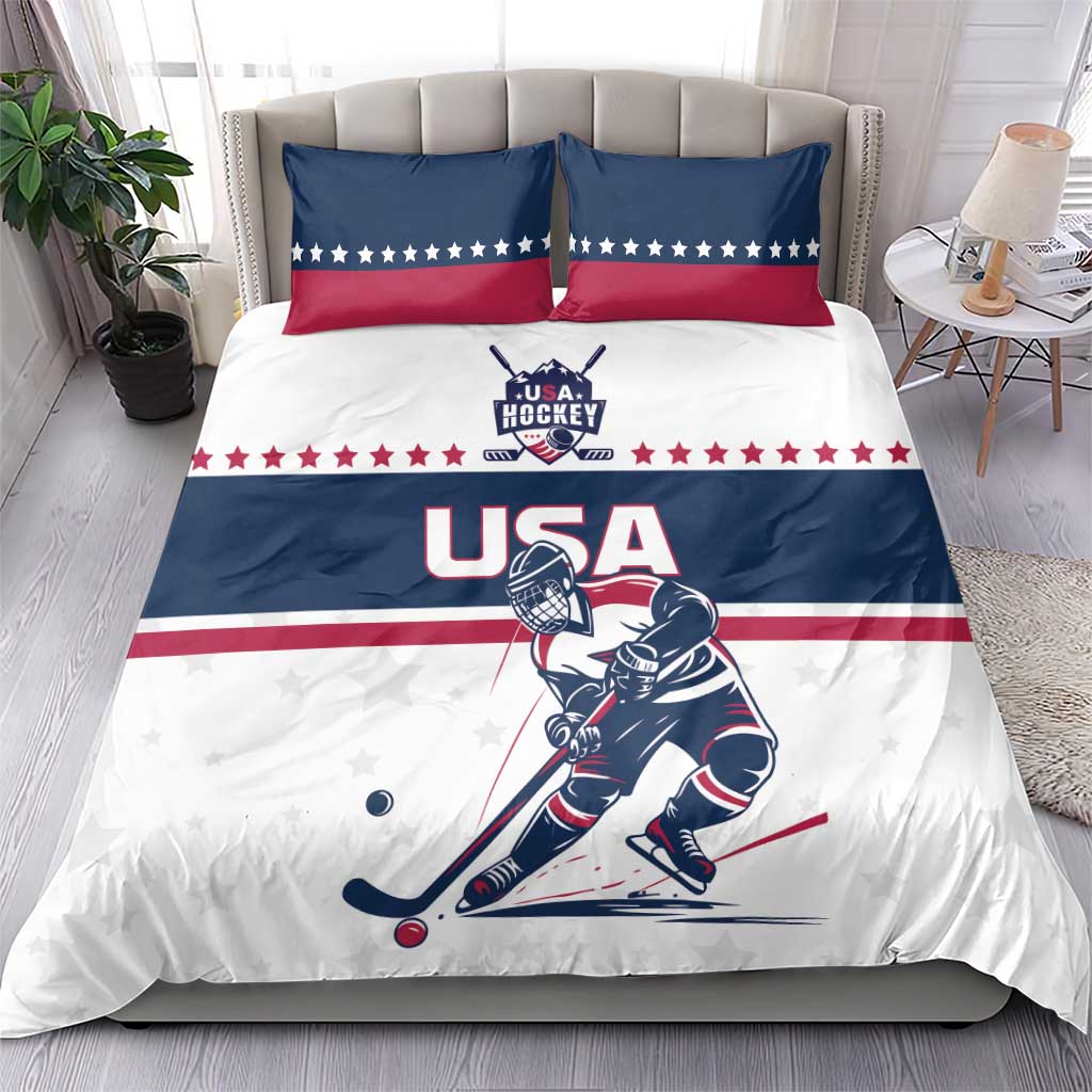 USA hockey bedding set on bed: blue/white duvet with red star border and two pillows
