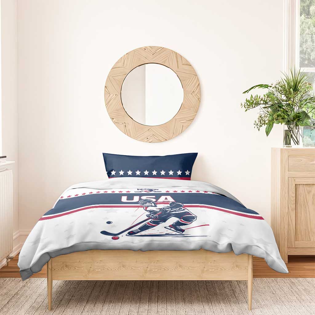 USA hockey bedding set on wooden bed: white/blue duvet with player graphic and two pillows