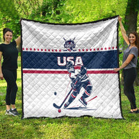 USA ice hockey quilt spread on grass: navy band, red stripe, stars, and player logo