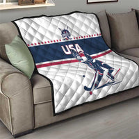 USA ice hockey quilt draped over a sofa arm: white diamond texture, navy stripe, red stars