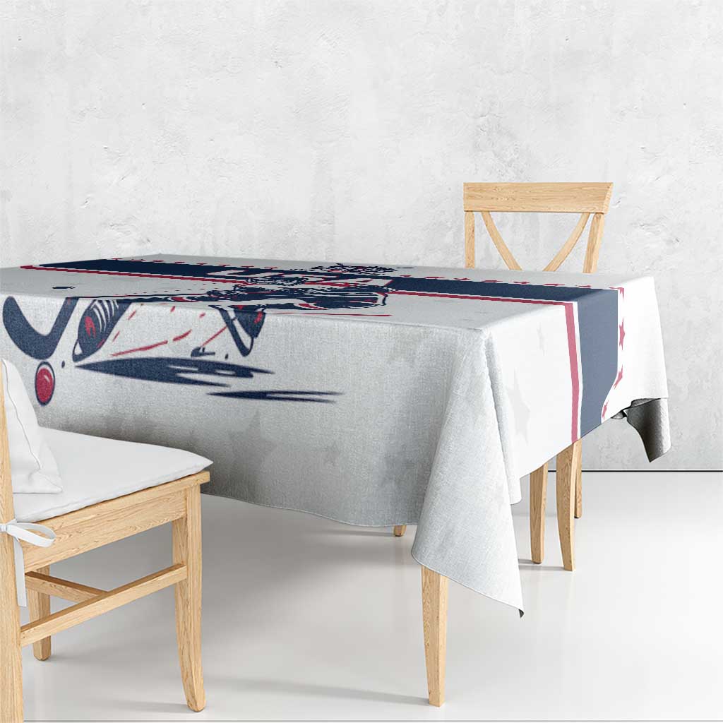 White ice hockey tablecloth corner detail with navy/red border and hockey player illustration