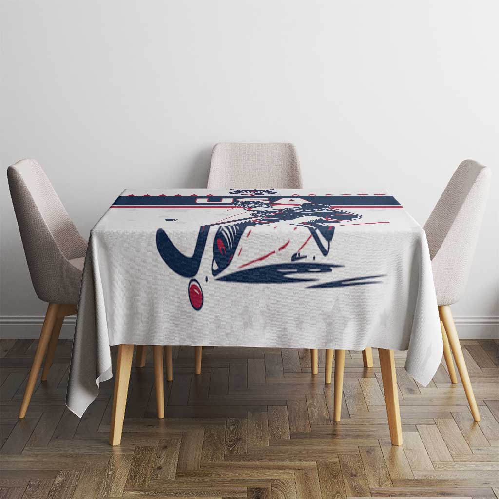 White ice hockey tablecloth on table with USA hockey logo and navy/red stripe, star accents