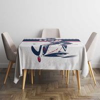 White ice hockey tablecloth on table with USA hockey logo and navy/red stripe, star accents