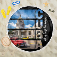 Round beach blanket with white fringe edge, black side, and city photo print