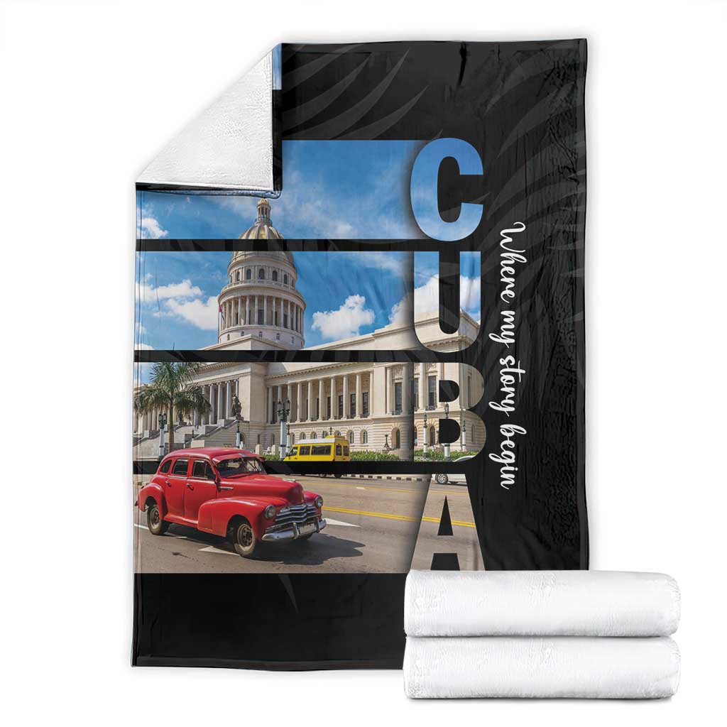 Black printed blanket with city landmark, red car, blue sky panel, and folded display