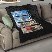 Black quilt on sofa with diamond quilting and Cuba capitol building and red car print