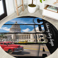 Black round area rug with Havana building, cars and blue letter graphic