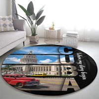 Black round area rug on floor with Havana building and vintage cars graphic