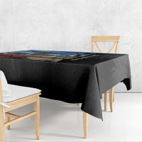 Black tablecloth with Cuba artwork and city scene, corner drop over table