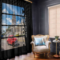 Black window curtain with blue-sky city print and vertical CUBA lettering, room view