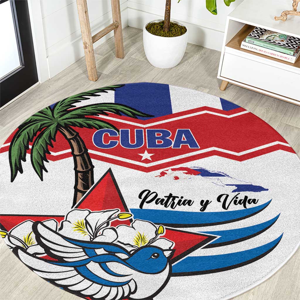 Round Cuba flag rug with blue bird, palm tree, and Patria y Vida text