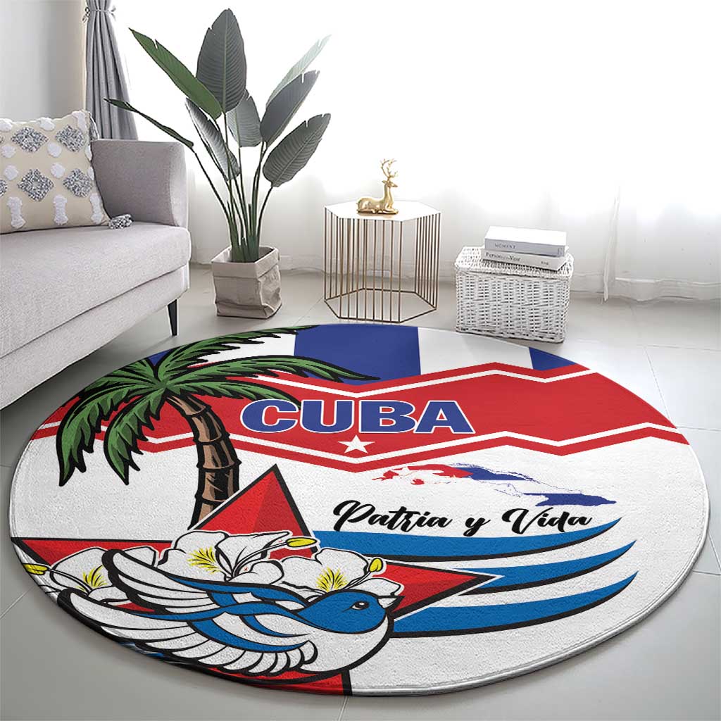 Round patriotic rug with CUBA and Patria y Vida text over bird-and-palm design