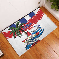 White rubber doormat with diagonal Cuba flag bands, palm tree, and blue bird graphic.
