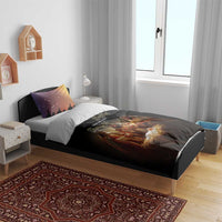 Black bedding set on bed: duvet shows three kings nativity; two purple-gold pillows