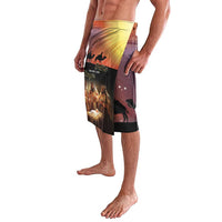 Printed swim shorts with elastic waist, yellow-orange sunburst, purple night stars