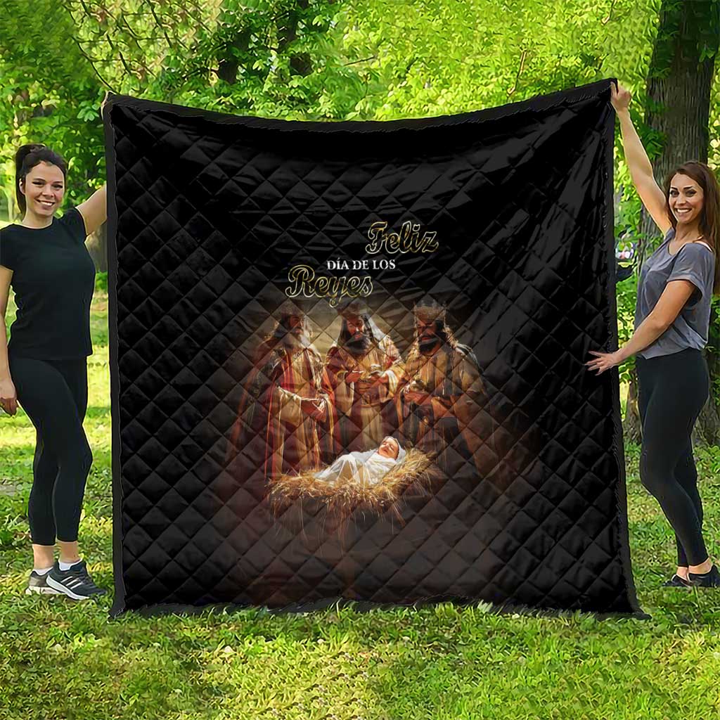 Black quilt blanket with diamond quilting and Feliz Dia de los Reyes Nativity design