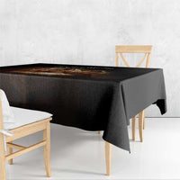 Black tablecloth with corner seam and straight drape on dining table