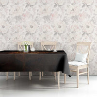 Black tablecloth on dining table with a neat, straight overhang edge