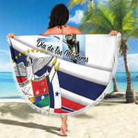 Round white beach blanket with “Dia de los Martires” and flag stripes, fringed border
