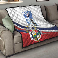 Panama Martyrs Day quilt on living room sofa, white quilted top with flag stripes