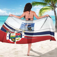 White Panama flag sarong draped by woman, long edge with emblem