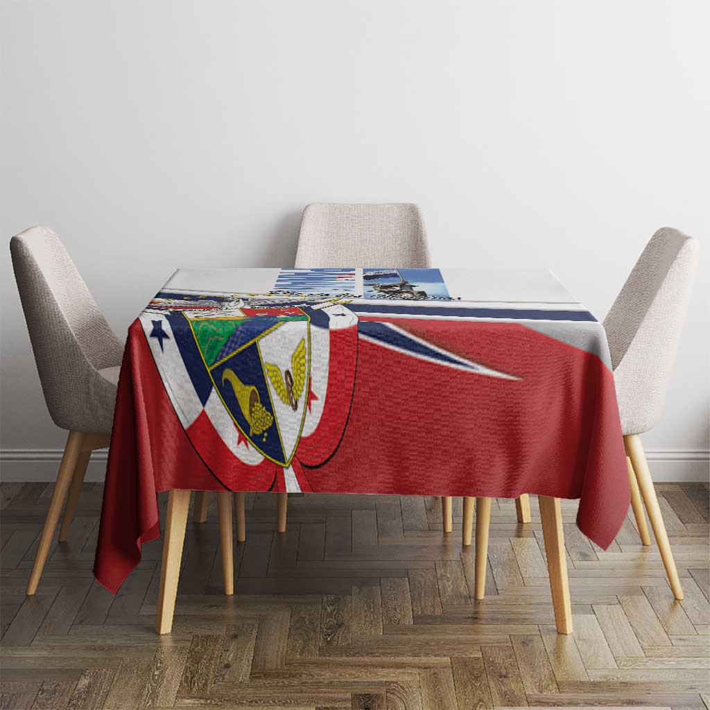 Printed tablecloth with red and blue flag design and large multicolor coat of arms