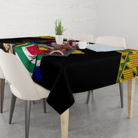 Black tablecloth with South Africa flag and portrait graphic across table