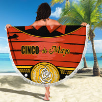 Round beach blanket with white fringe, black field and Cinco de Mayo banner design