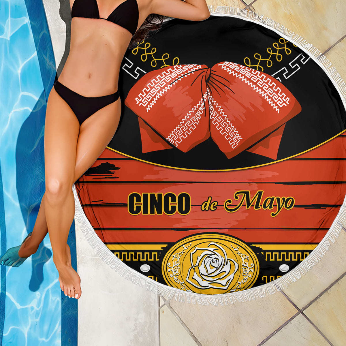 Round black beach blanket with fringe, red bow and Cinco de Mayo text graphic