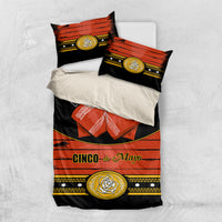 Cinco de Mayo bedding set: black-and-orange duvet with gold medallion, red bow, 2 pillowcases