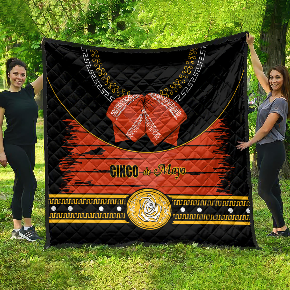 Black charro quilt with orange center stripe, red bow, gold emblem, 'Cinco de Mayo'