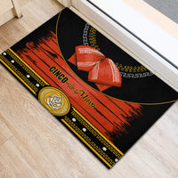 Black rubber doormat with red streak design, “Cinco de Mayo” text, and gold rose