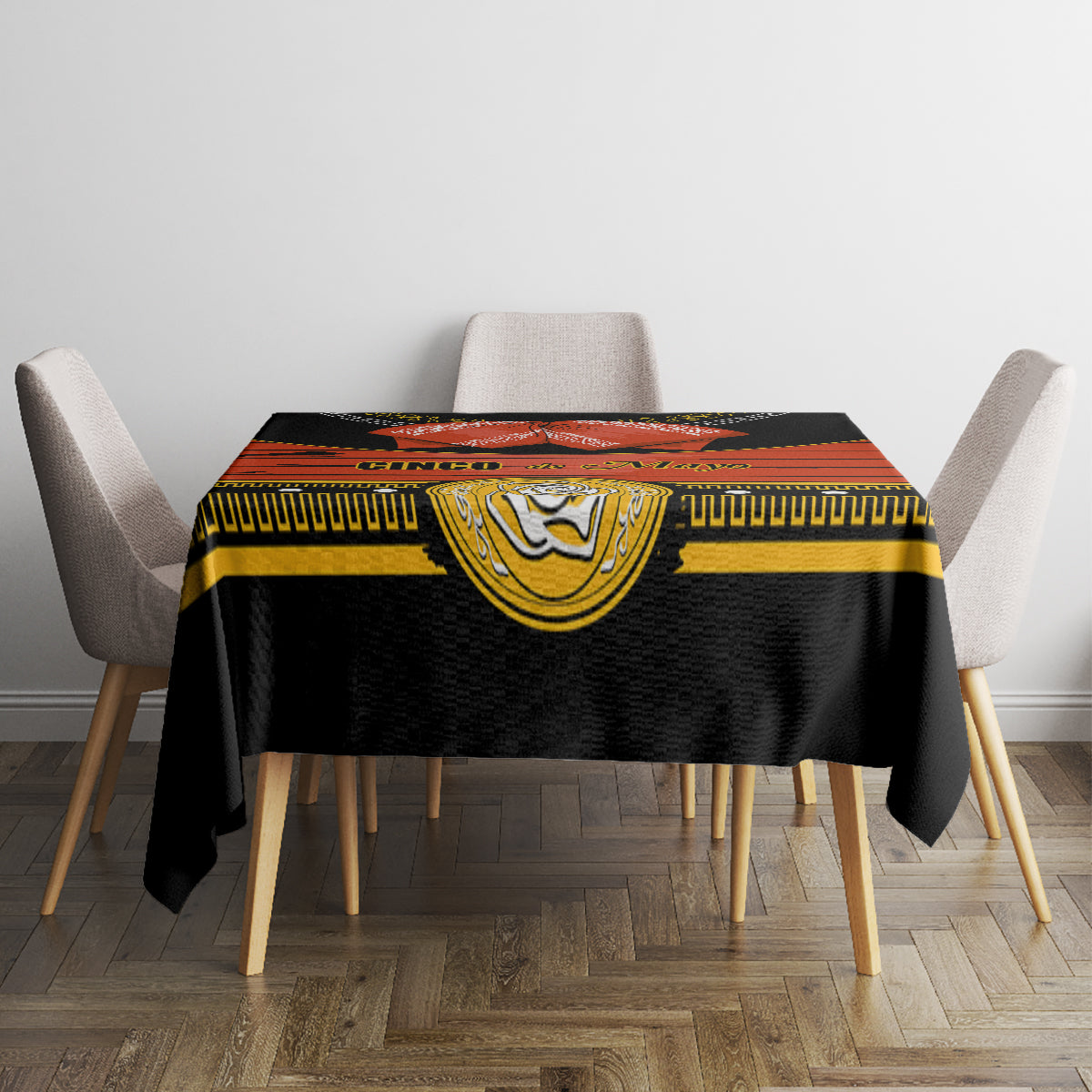 Black tablecloth with gold emblem panel and red banner style print across center