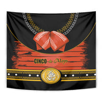 Black Cinco de Mayo tapestry with orange mountain design, gold trim, and central emblem