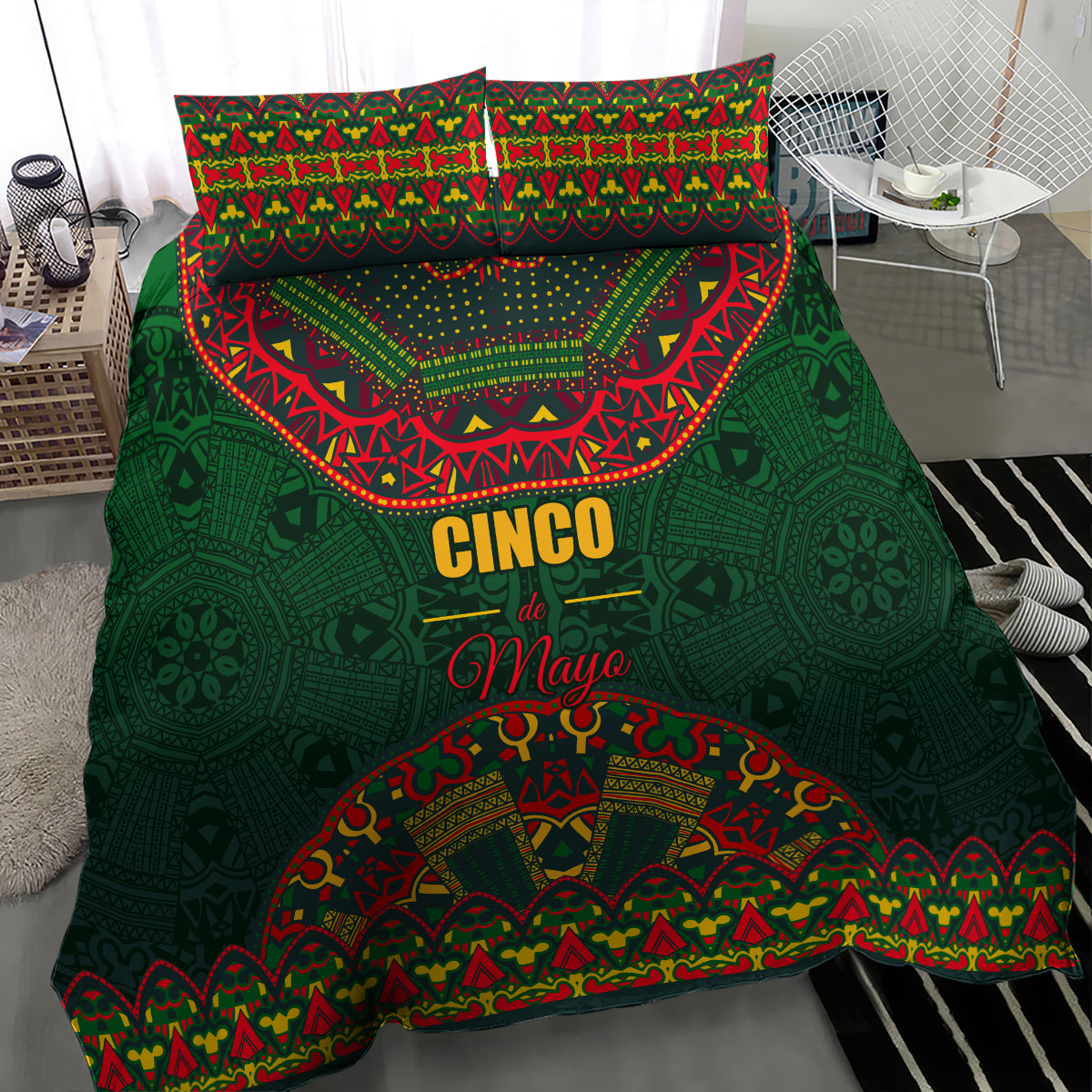 Green bedding set close view with colorful folk design comforter and two pillowcases.