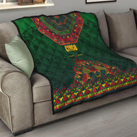 Green quilt with red-and-yellow Mexican folk pattern and 'Cinco Mayo' text