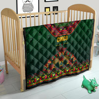 Green quilt blanket with red bandana print, 'Cinco' and 'Mayo' over diamond quilting