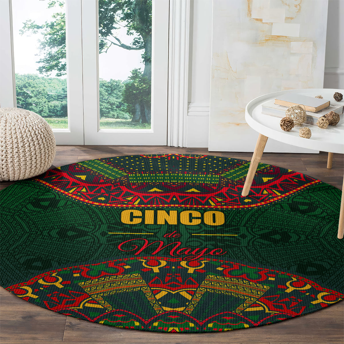 Green round carpet featuring “Cinco” and “de Mayo” lettering with colorful folk border