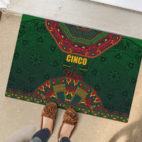 Green rubber doormat with Cinco de Mayo arch graphic and Mexican folk pattern