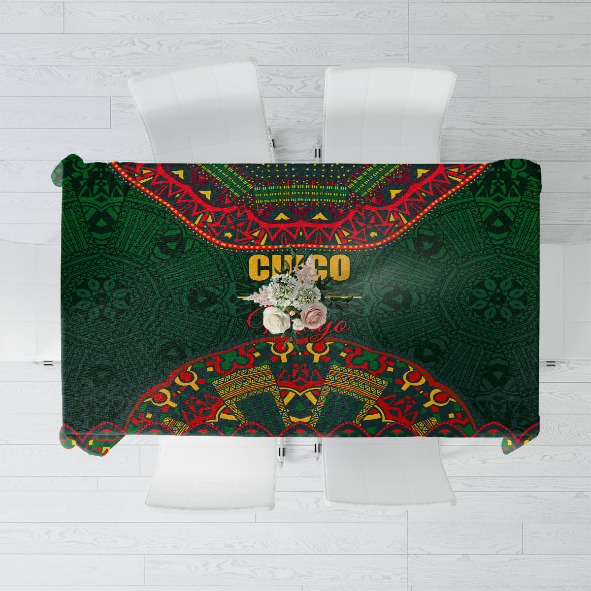 Green folk-pattern tablecloth with red and yellow decorative border and central motif