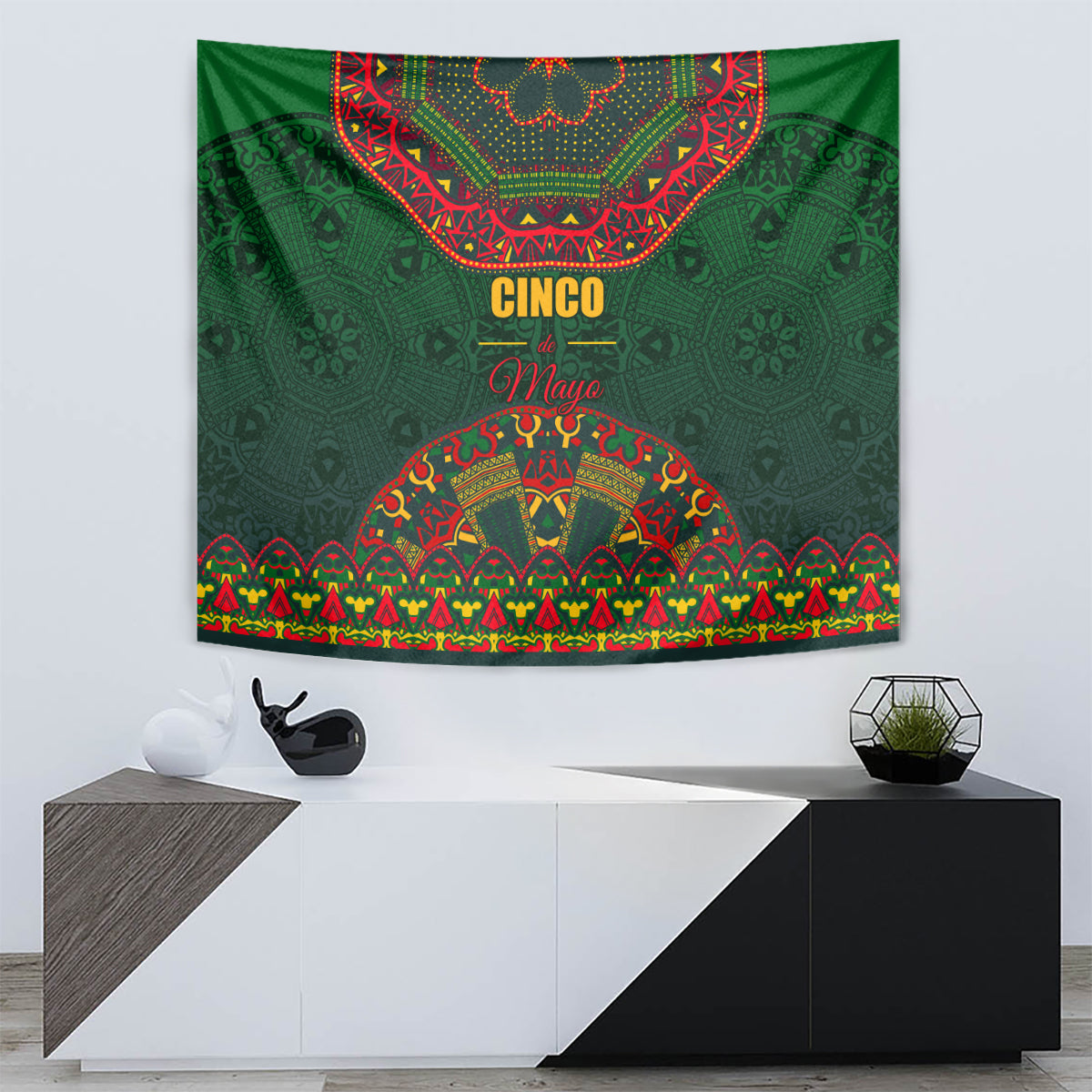 Green wall tapestry featuring Cinco May design with colorful ornamental border