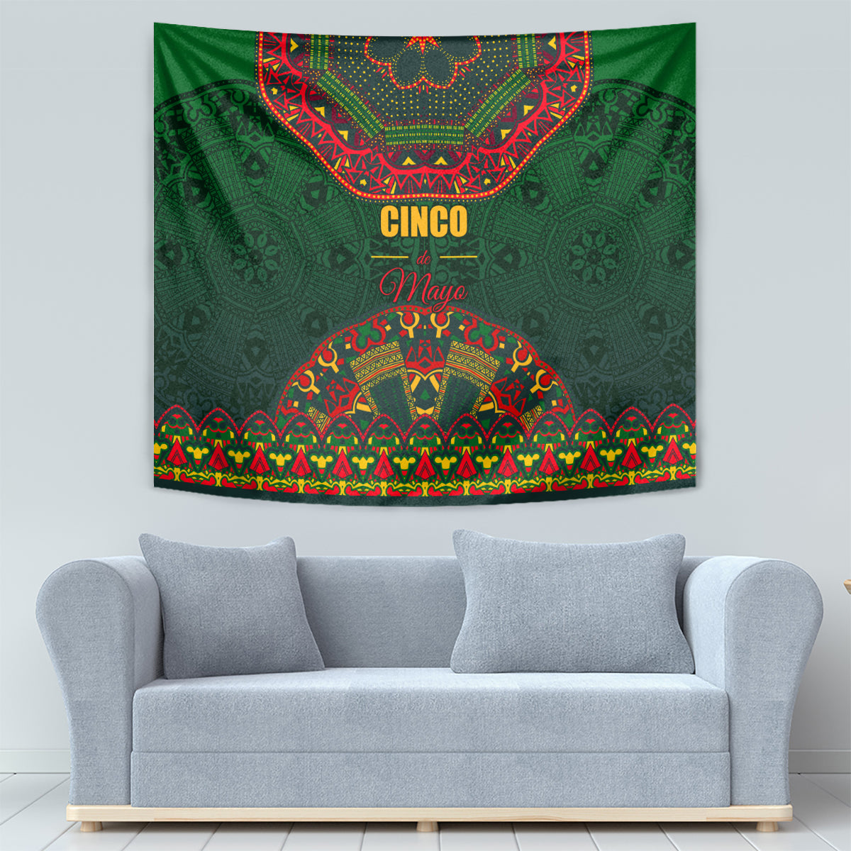 Green folk tapestry with Cinco May text and arched multicolor pattern above sofa