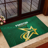 Green rubber doormat with Pakistan Cricket logo and gold star graphic