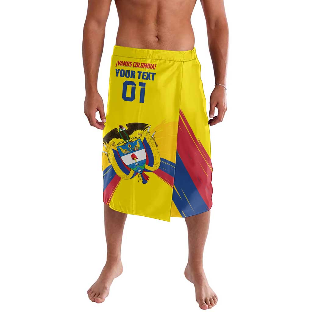 Yellow football-style wrap shorts with elastic waistband and Colombia crest graphic