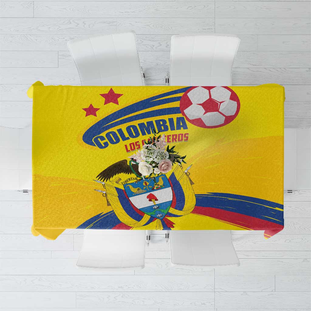 Yellow tablecloth panel showing Colombia text, crest, and soccer ball